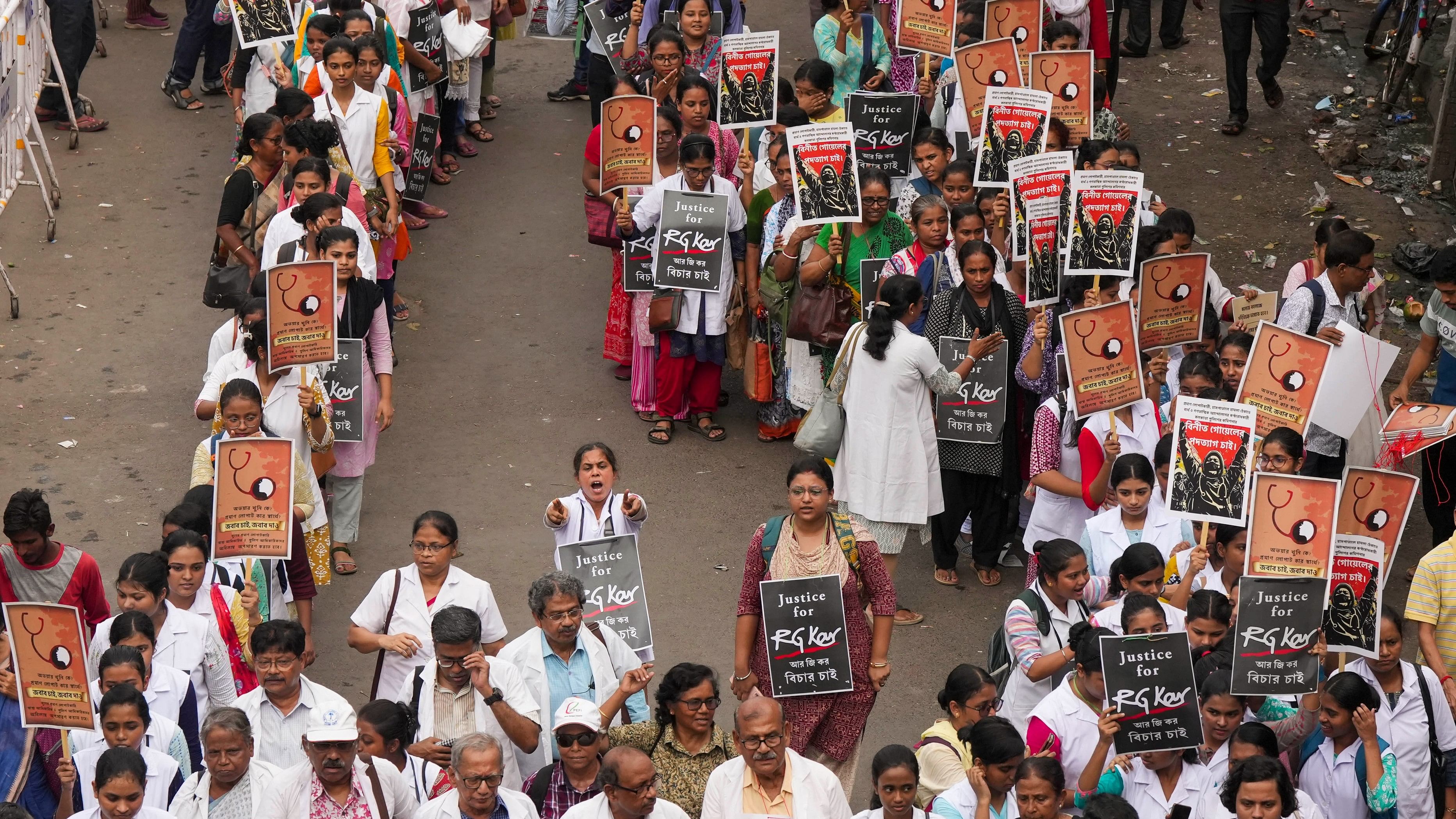 <div class="paragraphs"><p>Health workers and others take part in a protest rally against the West Bengal administration over the alleged sexual assault and murder of a trainee doctor, in Kolkata, Saturday, Sept. 7, 2024.</p></div>